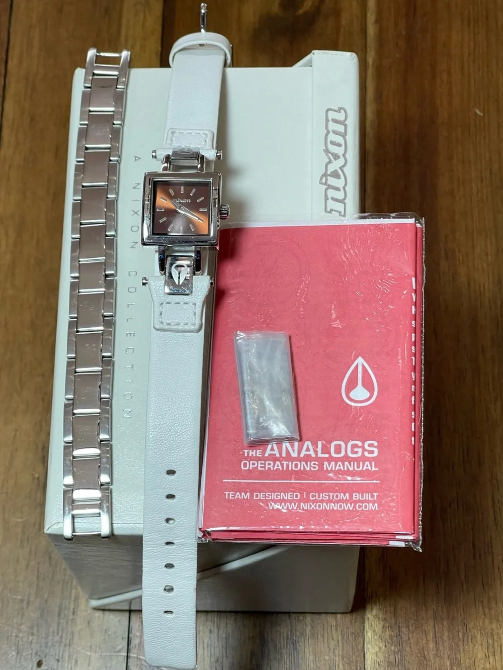 Nixon Matchmaker Women’s Square Watch with Metallic Orange Dial and White Strap